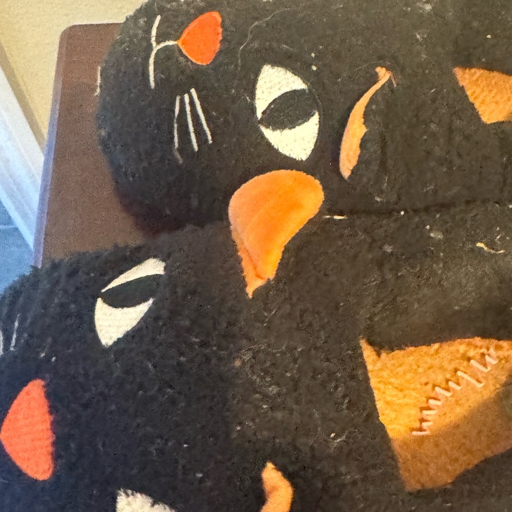 Black Cat Slippers with Orange Accents